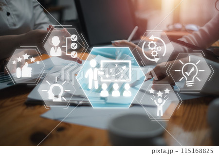 Coaching concept, Business team analyzing income charts and graphs on desk with Coaching icon on virtual screen. Coaching concept, Business team analyzing income charts and graphs on desk with Coaching icon on virtual screen. 115168825