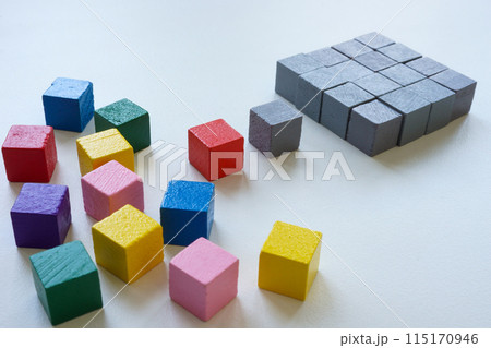 Diversity or ordering concept. Colored cubes and ordered structure of gray ones. 115170946