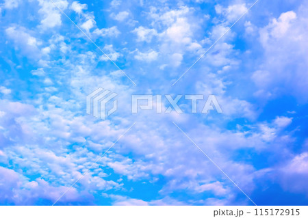 Light bright blue peaceful sky with white cirrus clouds 115172915