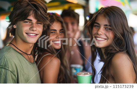 Teenage siblings enjoying a festive event with iced beverages, dressed for warm weather Teenage siblings enjoying a festive event with iced beverages, dressed for warm weather 115173239