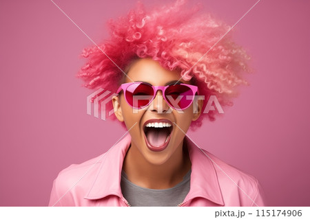 A woman with vibrant pink hair and stylish sunglasses is playfully contorting her face, creating a comical expression.	 115174906