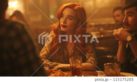 Beautiful red-haired woman at a table in a restaurant. 115175205