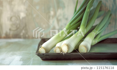 Green onions on the kitchen table. 115176118