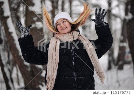 Funny teenage girl posing in the woods in winter. Funny teenage girl posing in the woods in winter. 115176775