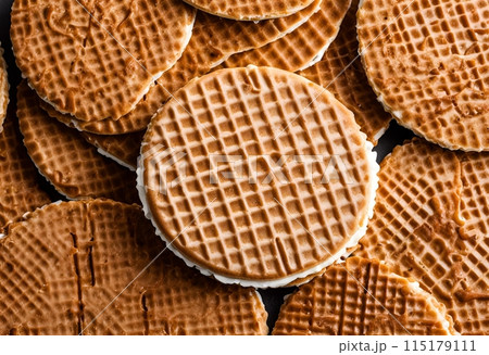Close up of a delicious Stroopwafel, a caramel-filled Dutch treat, AI Generated 115179111
