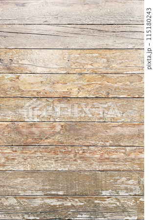 明るい薄茶色の木目のあるニスが剥がれ古びた板壁の表面の縦長の背景画像 明るい薄茶色の木目のあるニスが剥がれ古びた板壁の表面の縦長の背景画像 115180243
