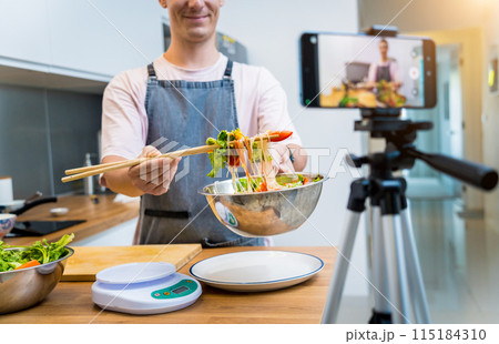 The chef is broadcasting live from workshop how to prepare a spicy glass noodle salad The chef is broadcasting live from workshop how to prepare a spicy glass noodle salad 115184310