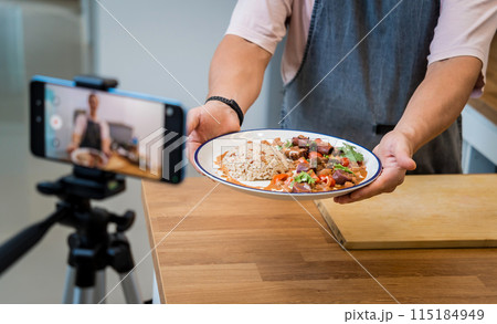 The chef is broadcasting live from workshop how to prepare a vegetarian massaman curry 115184949