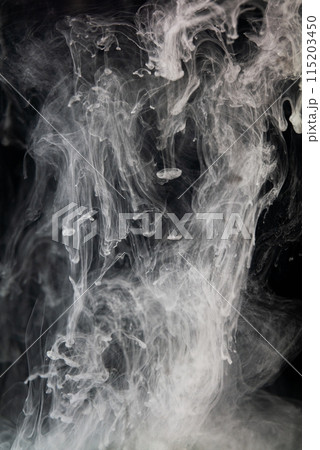 Graceful blend of white ink swirls cascading through black void, creating delicately interwoven patterns. Graceful blend of white ink swirls cascading through black void, creating delicately interwoven patterns. 115203450