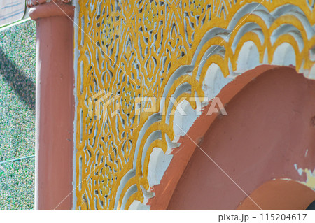 Elements of designer decoration of exterior parts of houses on streets of the city of Tangier in the Kingdom of Morocco. folk arts in the elements of decoration of facades of buildings, houses Elements of designer decoration of exterior parts of houses on streets of the city of Tangier in the Kingdom of Morocco. folk arts in the elements of decoration of facades of buildings, houses 115204617