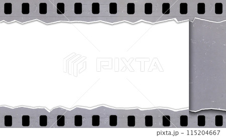 Tearing an old, used and dusty celluloid film strip Tearing an old, used and dusty celluloid film strip 115204667
