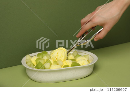 Ice cream with fresh melon in a bowl 115206697