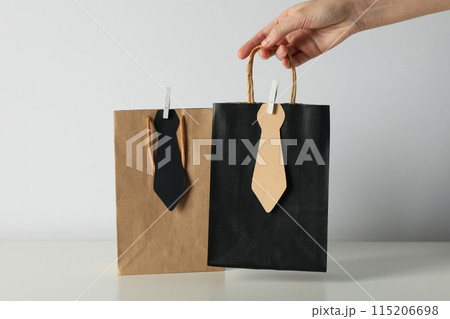 The concept of a gift for father's day, on a white background. The concept of a gift for father's day, on a white background. 115206698