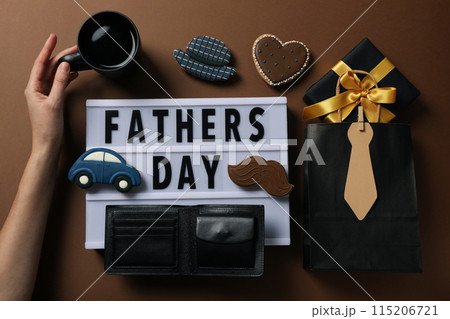 Father's day concept, gifts and greetings, on a brown background. 115206721