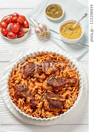 baked greek chicken orzo stew in tomato sauce 115206834