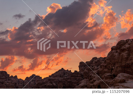 colorful sunset sky, rocks in Little Petra, Jordan 115207096