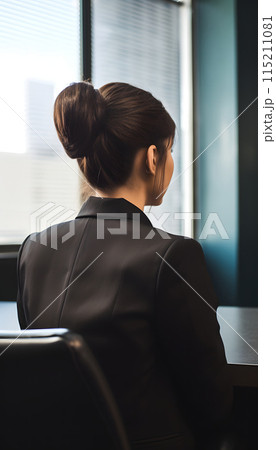Back view of a woman in a suit waiting for a job interview, generated AI 115211081
