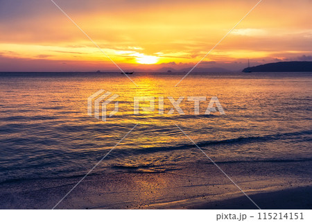 Amazing clouds and waves in sunset sky in Ao Nang, Thailand. 115214151