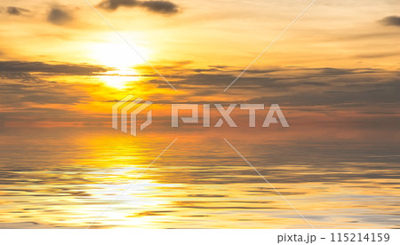 Panorama of an amazing golden sunset with sea waves against a cloudy sky. Panorama of an amazing golden sunset with sea waves against a cloudy sky. 115214159