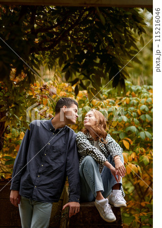 Warm Embrace of Teen Love in the Autumn Park. Capturing Teen Moments: Love Blossoms in Autumn's Embrace. Teenagers in Love: Embracing the Autumn Vibe Warm Embrace of Teen Love in the Autumn Park. Capturing Teen Moments: Love Blossoms in Autumn's Embrace. Teenagers in Love: Embracing the Autumn Vibe 115216046