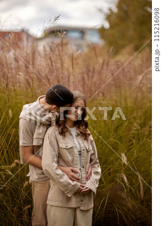 Young Cute Female Hugs Boyfriend. In Autumn Outdoor. Lovers Walking in Park. Attractive Funny Couple. Lovestory in Forest. Man and Woman. Cute Lovers in the Park. Family Concept. Happy Couple. Young Cute Female Hugs Boyfriend. In Autumn Outdoor. Lovers Walking in Park. Attractive Funny Couple. Lovestory in Forest. Man and Woman. Cute Lovers in the Park. Family Concept. Happy Couple. 115216098