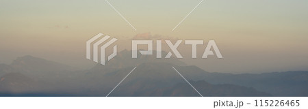 travel and people activity concept with twilight sky before sunset with layer of mountain travel and people activity concept with twilight sky before sunset with layer of mountain 115226465