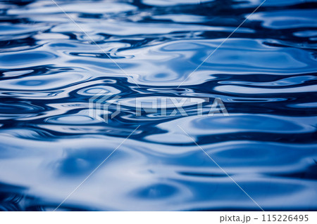 A image of blue ocean waves featuring a water surface in detail 115226495