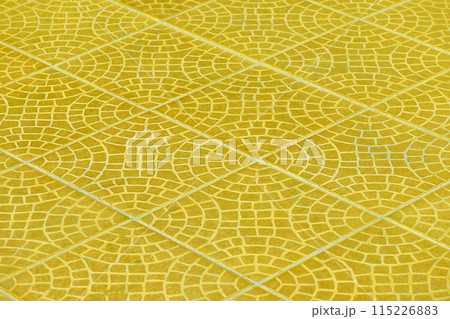 Bright yellow floor tile stone ceramic abstract mosaic pattern surface street road city texture background vibrant structure Bright yellow floor tile stone ceramic abstract mosaic pattern surface street road city texture background vibrant structure 115226883