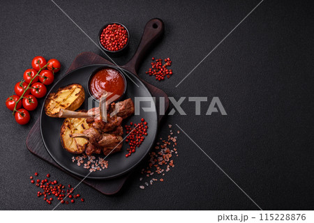 Delicious juicy meat on the bone or rack of lamb or grilled veal 115228876