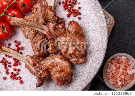 Delicious juicy meat on the bone or rack of lamb or grilled veal 115228968