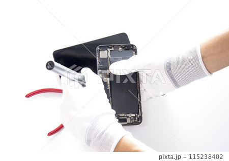 top view, technician fixing a smartphone 115238402