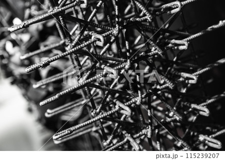 Industrial background photo with dark steel reinforcement 115239207