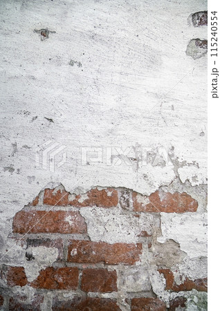 A white brick and orange wall. A white painted old brick wall background 115240554