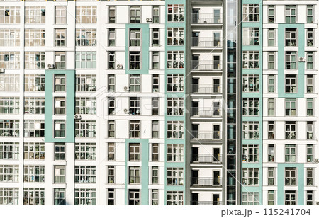 New apartment building of modern architecture. Modern residential quarter of the city. Development, construction, housing concept. New apartment building of modern architecture. Modern residential quarter of the city. Development, construction, housing concept. 115241704