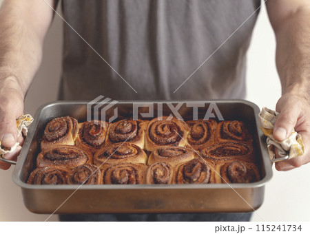 Cinnamon bun roll in plate. Homemade Oven bakery desert for breakfast 115241734