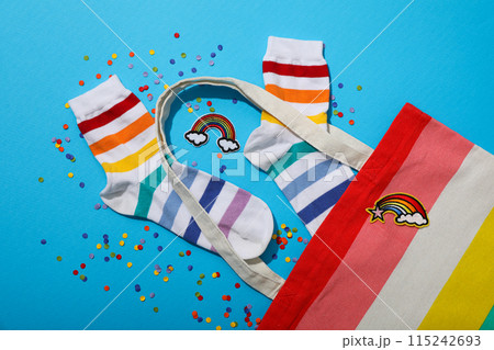 LGBT parade concept, festive colorful symbols on blue background. 115242693