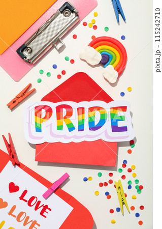 LGBT parade concept, free love symbol on light background. LGBT parade concept, free love symbol on light background. 115242710