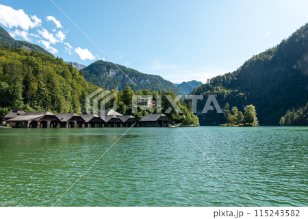 Boathouses at Lake Koenigssee in Schoenau in Bavaria Boathouses at Lake Koenigssee in Schoenau in Bavaria 115243582