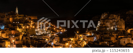Famous cave church Saint Mary of Idris and the cathedral of Matera at night, Southern Italy Famous cave church Saint Mary of Idris and the cathedral of Matera at night, Southern Italy 115243655