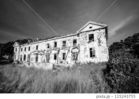 Abandoned former hotel near Dubrovnik, left during Jugoslavian war 1991 115243755