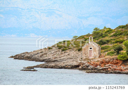 Beautiful little abandoned chapel at the coast of Hvar island 115243769