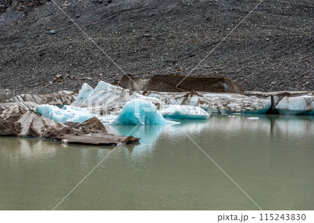 Colorful ice at the Pasterze Glacier at the Mount Grossglockner 115243830