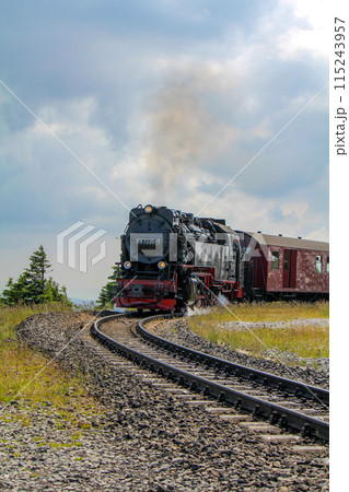 Antique steam locomotive in the Harz mountains 115243957
