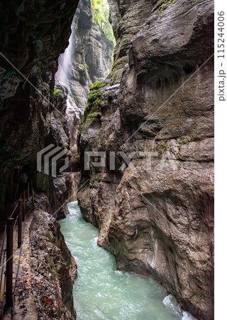 Hiking through the scenic Partnach gorge near Garmisch-Partenkirchen in the Bavarian Alps Hiking through the scenic Partnach gorge near Garmisch-Partenkirchen in the Bavarian Alps 115244006