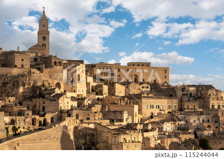 Magnificent skyline of historic Matera with the cathedral and cave church of Saint Mary of Idris, Southern Italy Magnificent skyline of historic Matera with the cathedral and cave church of Saint Mary of Idris, Southern Italy 115244044