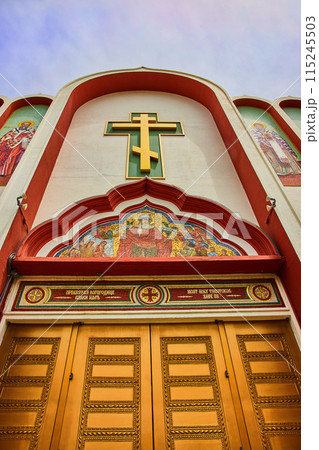 Doors below religious mosaic on exterior of Holy Virgin Cathedral Joy of All Who Sorrow 115245503