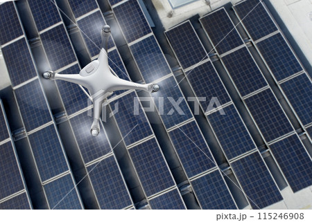 Quadcopter UAV Drone Flying A Solar Panel Roof Inspection. Quadcopter UAV Drone Flying A Solar Panel Roof Inspection. 115246908