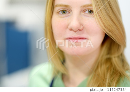 Portrait of beautiful female pediatrician during appointment of patient in office a modern clinic Portrait of beautiful female pediatrician during appointment of patient in office a modern clinic 115247584