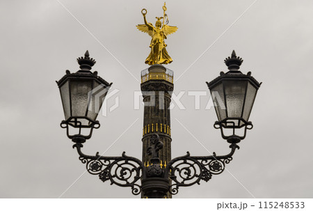 Street lamppost with The victory column in the background. Street lamppost with The victory column in the background. 115248533