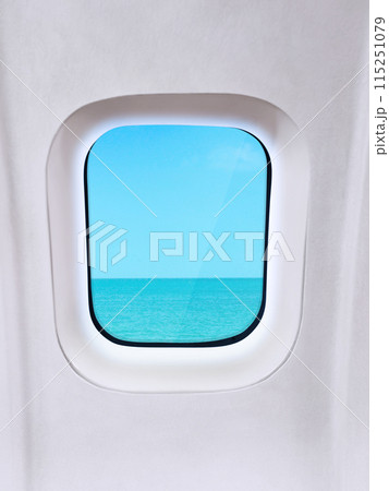 airplane window view sea and sky airplane window view sea and sky 115251079